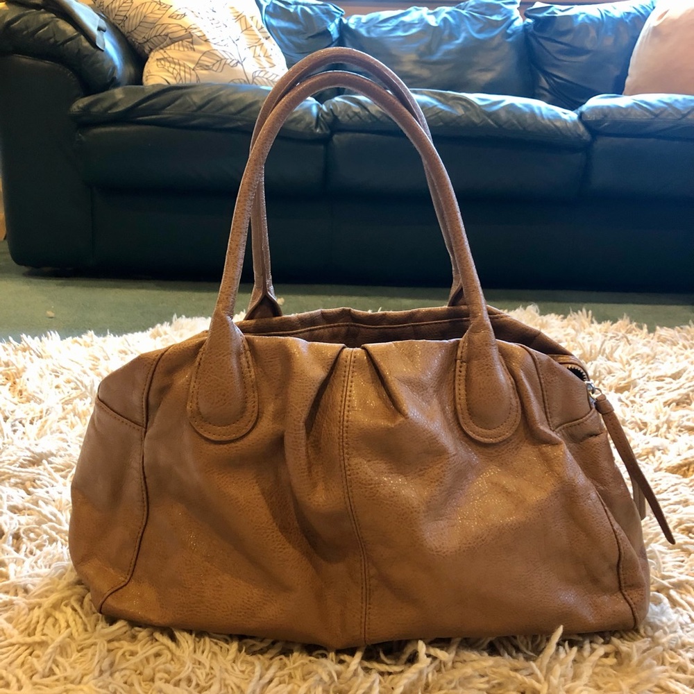 Medium sized purse, beautiful condition - feels good & goes with every outfit.